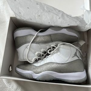 Womens Air Jordan 11 Retro in white and metallic silver